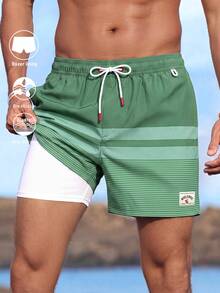 Manfinity KASUA Men Loose Striped Beach Shorts In Vacation Style Milk Silk Lining - Green - View 1