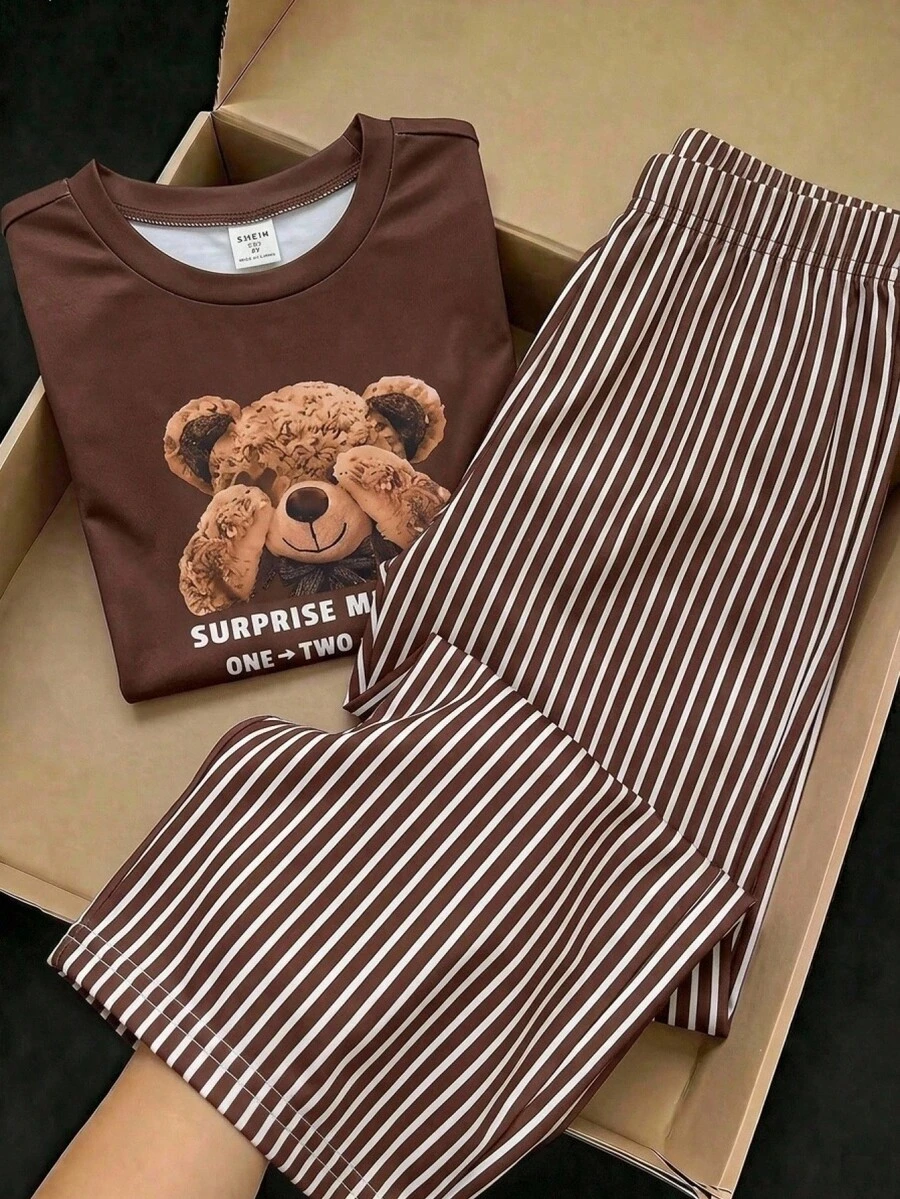 SHEIN 柔軟舒適面料,可愛熊圖案搭配俏皮設計,圓領+短袖適合日常穿著。配色縱條紋寬腿褲,寬鬆版型讓活動不受限。溫柔棕色調,居家與外出皆宜,易穿著套裝,小女孩休閒風格 - 棕色 - 查看 1