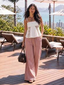 Nöista Pantalones anchos a rayas en color rosa, con una silueta recta y relajada, son elegantes y casuales. El color suave y elegante, así como el material ligero, los hacen adecuados para diversas ocasiones de primavera y verano, desde el trayecto diario hasta las cafeterías y los viajes de fin de semana. Se pueden combinar con tops de punto cortos, camisas y camisetas para crear diferentes estilos. - Rosa - Ver 7
