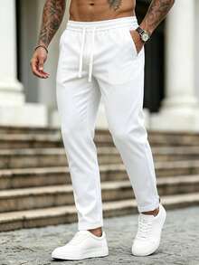 Manfinity CasualCool Men's Mature Casual Solid White Tapered Plus Size Long Pants - White - View 1