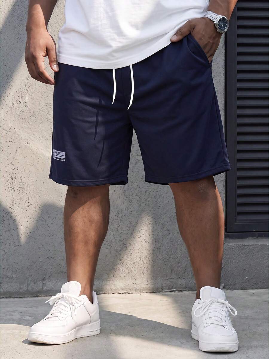 DRIVNCORE Plus-Size Men's Solid-Colored Patchwork Drawstring Casual Shorts For Summer - Navy Blue - View 1