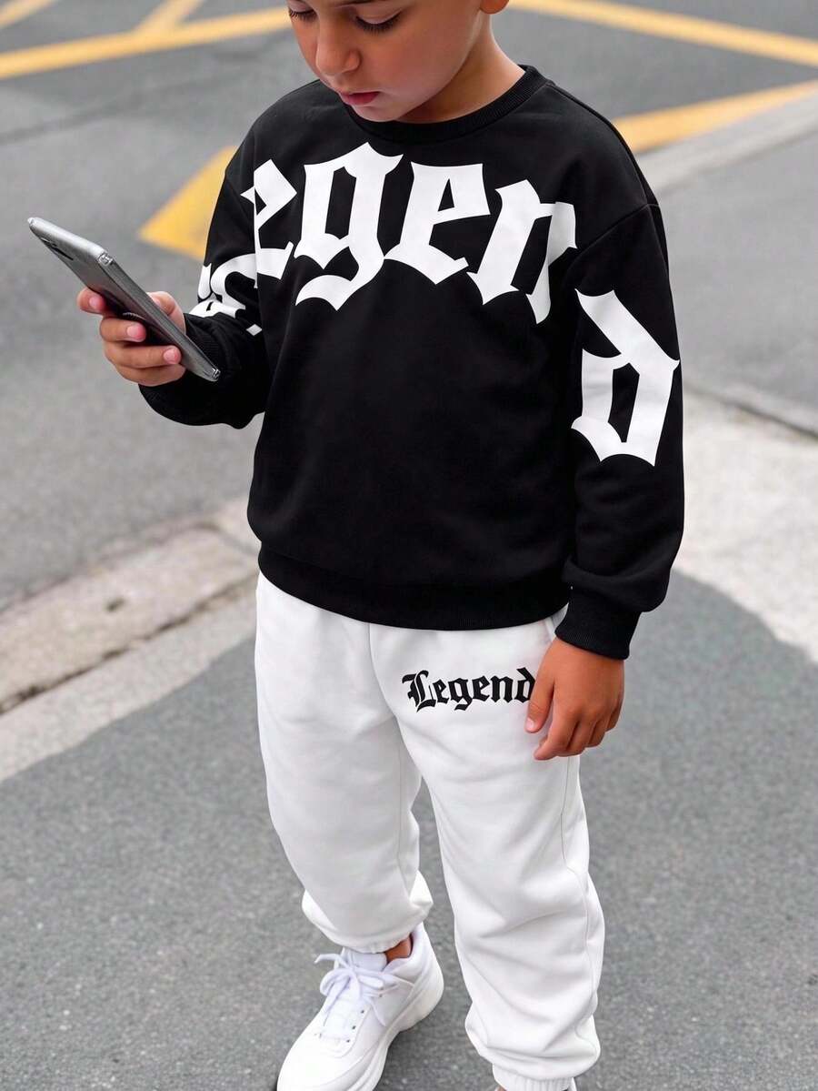 SHEIN 兒童青少年男孩休閒酷風大字母圖案黑色套頭運動衫與白色運動長褲套裝,適合秋冬、學校、家庭聚會、返校、運動、秋季穿搭、冬季穿搭 - 彩色 - 查看 1
