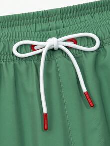 Manfinity KASUA Men Loose Striped Beach Shorts In Vacation Style Milk Silk Lining - Green - View 6