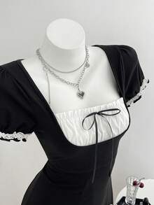 Elamini Robe courte d'été douce vintage noir & blanc contraste avec bordure en dentelle et nœud fendu - Noir - Voir 6