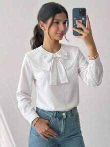 SHEIN 兒童青少年女孩春秋彼得潘領 3D 蝴蝶結長袖寬鬆白色襯衫上衣 百搭清新學院風小眾法式荷葉邊開學校服童裝秋冬套裝 - 白色 - 查看 1