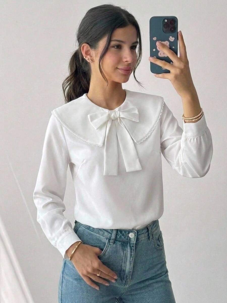 SHEIN 兒童青少年女孩春秋彼得潘領 3D 蝴蝶結長袖寬鬆白色襯衫上衣 百搭清新學院風小眾法式荷葉邊開學校服童裝秋冬套裝 - 白色 - 查看 1