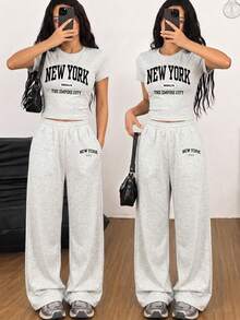 青少年女孩休閒極簡風 NEW YORK 圖案淺灰色修身短袖短版上衣搭配寬鬆長褲，2件套度假夏季穿搭，適合春夏，舒適春夏風格 - 白色 - 查看 1