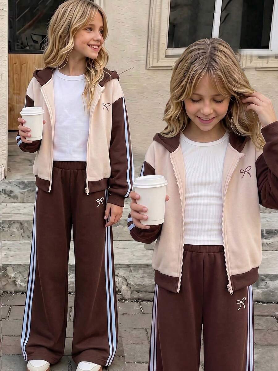 SHEIN طقم من قطعتين للبنات الصغيرات لفصلي الربيع والخريف بألوان القهوة والكريم بتصميم كتل لونية، كاجوال ورياضي، بلوزة رياضية محبوكة مع جاكيت بغطاء رأس وسحاب وتطريز فيونكة وجيوب جانبية مزدوجة - متعدد الألوان - مشاهدة 1