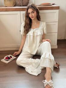Snug Reverie Women's Square Neck Embroidered Ruffle Short Sleeve Top And Long Pants Pajama Set - Apricot - View 1