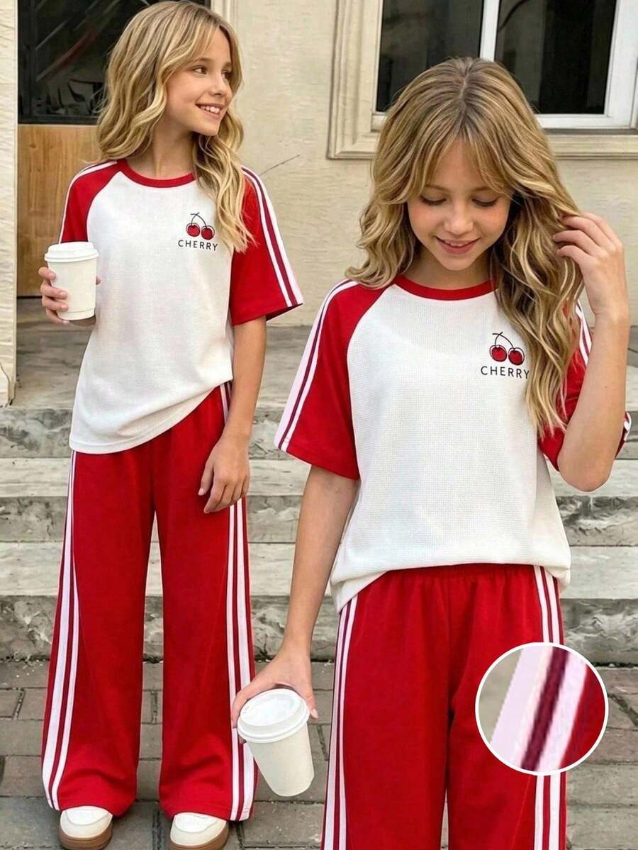 SHEIN Casuvi Kids 女童大童秋冬過渡運動學院風粉色與深綠色拼接短袖T恤短褲套裝,夏季寬鬆修身設計,輕量面料,適合日常穿著、休閒運動或搭配造型 - 彩色 - 查看 1