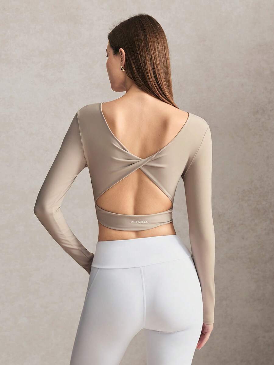 Activina Women's Solid Color Back Cutout Twist Design Long Sleeve Cropped Sports T-Shirt - Beige - View 1
