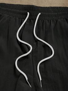 Gym Rark Pantalones deportivos largos para hombre con estampado de letras y cintura con cordón - Negro - Ver 3