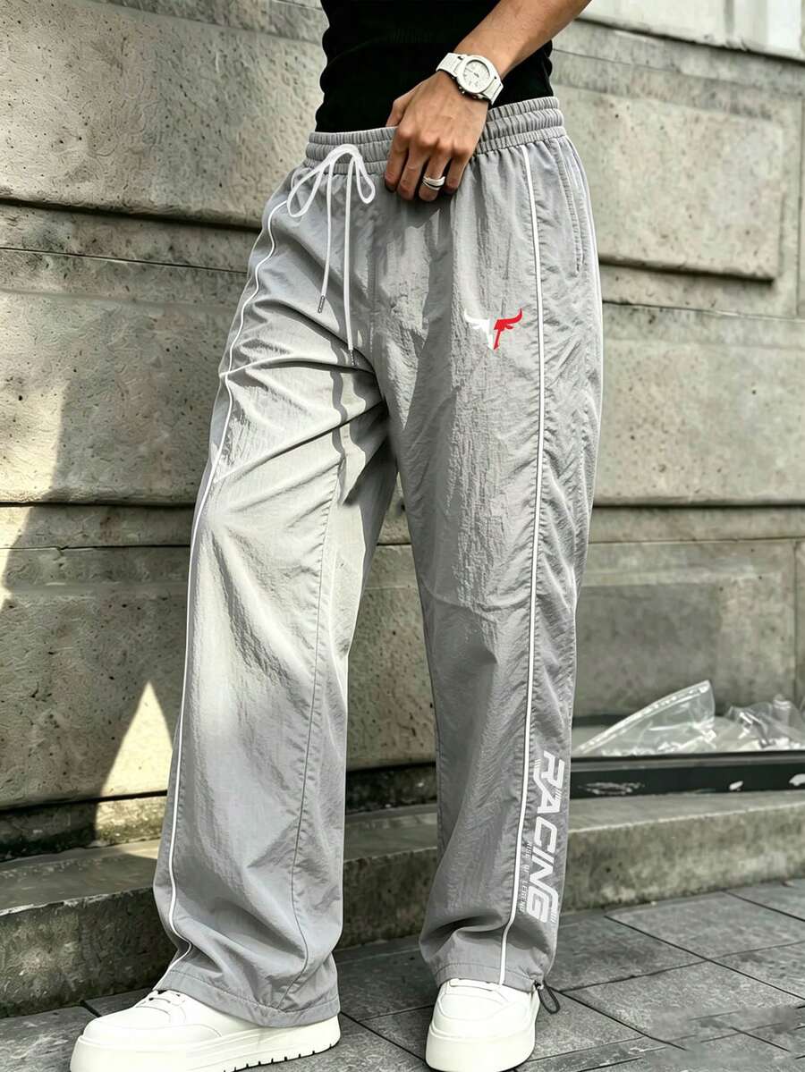 Sport MetroGents Celana Panjang Olahraga Pria dengan Motif Huruf - Dark Grey - View 1