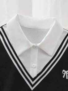 SHEIN Explorewe 女童運動衫套裝，黑白學院風 2 合 1 套裝，拼接印花條紋 V 領背心搭配可愛蝴蝶結印花細節，配條紋花卉寬腿褲，寬鬆版型修飾身形，經典配色百搭實用，適合日常穿著、上學與外出，展現甜美優雅女孩氣質 - 黑與白 - 查看 3