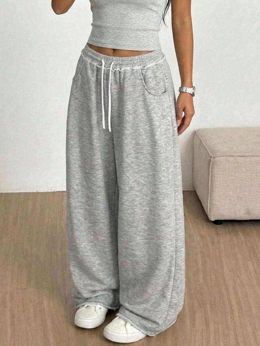 SHEIN Pantalones de chándal de cintura media cómodos y minimalistas con cordón decorativo de contraste de color para niñas preadolescentes, otoño/invierno - Gris - Ver 1