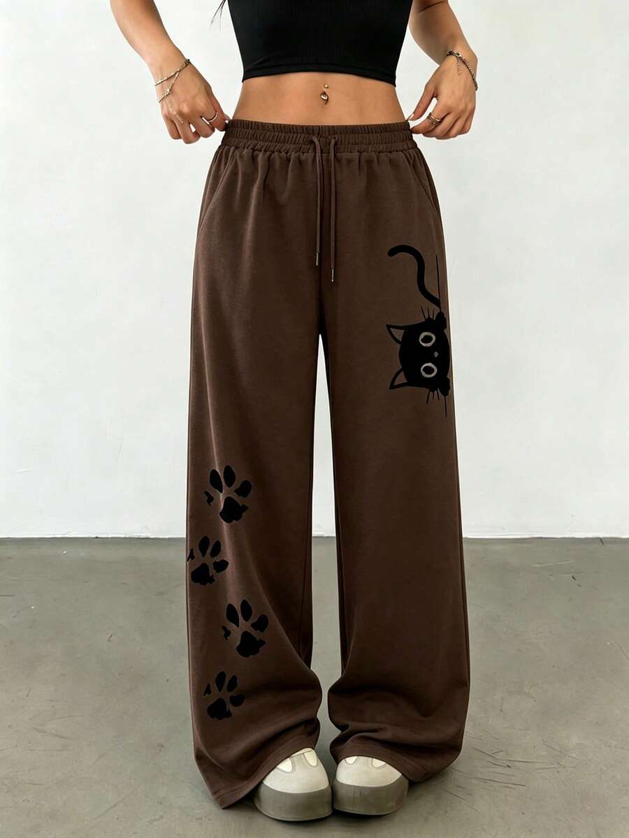 SHEIN 女款咖啡棕貓咪圖案直筒寬鬆長款輕量運動褲,舒適慢跑褲,爪印設計,抽繩腰頭,趣味印花慢跑褲,休閒四季通用褲,優雅舒適設計,休閒外出薄款運動褲,咖啡棕休閒針織褲 - 咖啡棕 - 查看 1