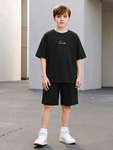 SHEIN 2pcs/Set Kids Tween Boy Casual Letter Print Pattern Round Neck Short Sleeve Top And Shorts Outfit - Black - View 5