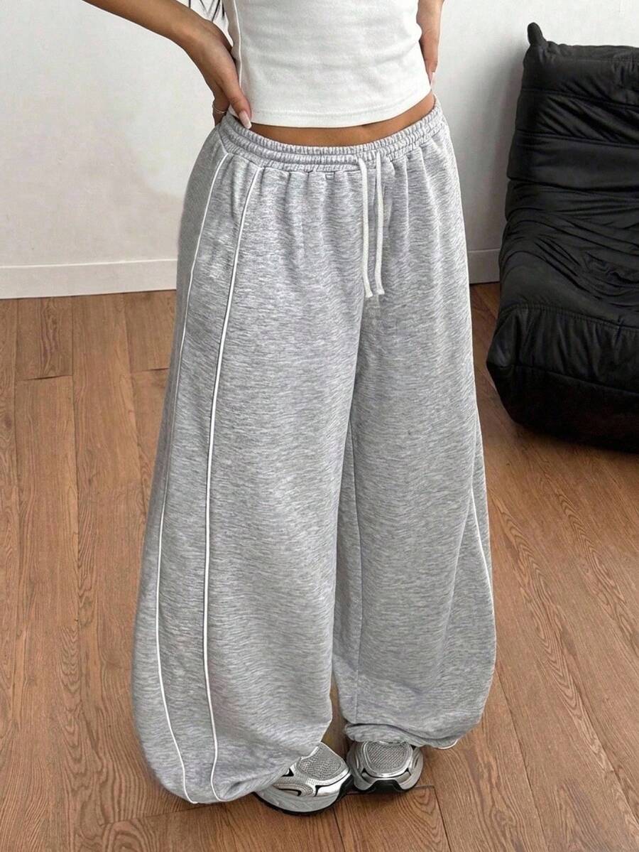 SHEIN Pantalón de chándal holgado con cintura con cordón y estampado para niña preadolescente, ideal para volver al colegio, básico y versátil para uso diario - Gris - Ver 1