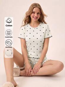 SHEIN قطن 2 قطعة قميص أبيض بنمط قلب أسود محبوك بالحياكة المحزمة ذو رقبة دائرية وأكمام قصيرة، وشورت مفصل بخياطة متباينة، ملابس منزلية مريحة وكاجوال، طقم بيجاما للنساء 2 قطعة - أبيض - مشاهدة 1