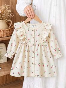 SHEIN Vintaside Kids 1件女嬰春秋款奶油色與玫瑰紅溫柔田園風小玫瑰滿版印花荷葉袖荷邊長袖單排扣A字洋裝，收腰寬鬆版型，適合日常穿著、戶外出遊、1歲生日派對、家庭聚會、拍照 - 杏色 - 查看 4