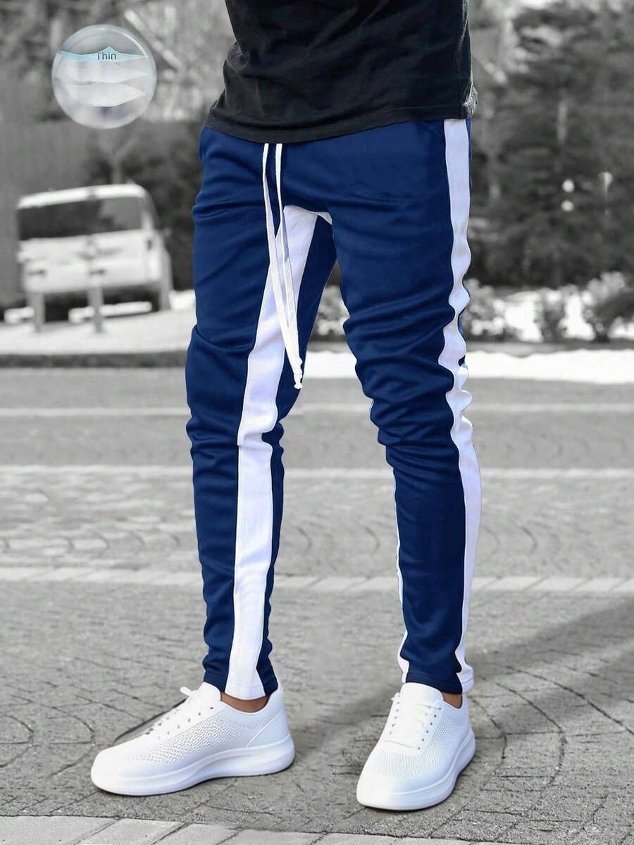 Manfinity Homme بنطلون رياضي للرجال مع لوحة تباين وسحاب - أزرق بحري - مشاهدة 1