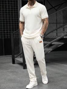 Manfinity CasualCool 男士春夏高品質 Polo 套裝，熱銷舒適斜紋素色提花布料，經典短袖拉鍊 Polo 衫 + 抽繩鬆緊腰長褲，休閒度假、極簡辦公、朋友約會、派對聚會、宴會，適合正式或非正式場合，極簡熱銷百搭風格，適合自穿或送給朋友 - 米色 - 查看 1