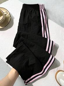 SHEIN 青少年女孩黑色與粉色側條紋彈性腰寬鬆休閒街頭風運動長褲，適合學校秋季穿著 - 黑色 - 查看 3
