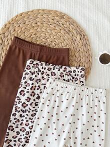 SHEIN 3-Pieces Baby Girl Long Pants Set, Solid Dark Brown Vertical Stripe Style Low-Key And Soft, Beige With Small Black Heart Pattern Cute And Fresh, Classic Leopard Print Style Personalized And Fashionable. All Pants Feature Slightly Ruffled Cuffs, Three Styles Suitable For Various, Overall Color Tone Unified And Harmonious. - Multicolor - View 5