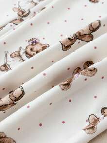 SHEIN طقم ملابس منزلية كاجوال مريح من قطعتين للبنات المراهقات الصغيرات، بنطلون طويل مع كشكشة وحافة مزينة بطبعة دب، بتصميم بسيط وجميل - لون مشمشي - مشاهدة 7