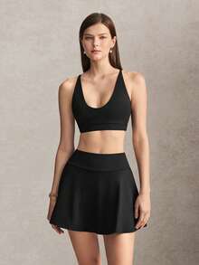 Activina Damen Sommer- und Frühjahrs-Activewear Zweiteiler Set mit schwarzem Sport-BH mit Kreuzrücken, Mini-Skater-Rock und praktischer Tasche, ideal für Sport - Schwarz - Übersicht 5