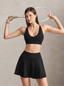 Activina Damen Sommer- und Frühjahrs-Activewear Zweiteiler Set mit schwarzem Sport-BH mit Kreuzrücken, Mini-Skater-Rock und praktischer Tasche, ideal für Sport - Schwarz - Übersicht 8