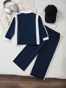 SHEIN 2pcs/Set Boys Minimalist Classic Black & White Matching Outfit, Top With 3D Letter Embroidery, Pants With Cuffed Hem & Patchwork Design, Casual Sporty Style For Daily Wear & School - Navy Blue - View 2