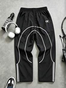 Gym Rark Pantalones largos deportivos para hombre con ribete en contraste, para gimnasio - Negro - Ver 1