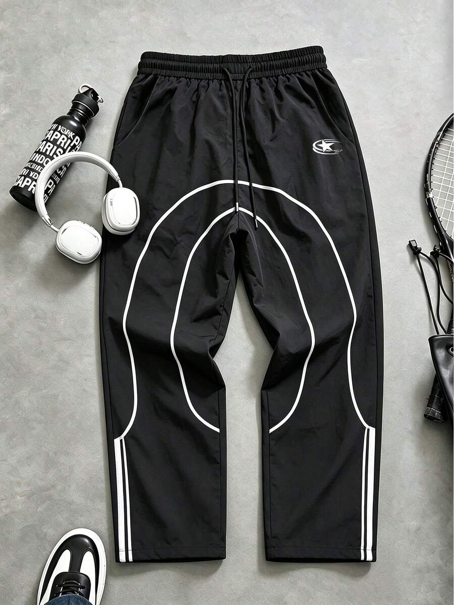 Gym Rark Pantalones largos deportivos para hombre con ribete en contraste, para gimnasio - Negro - Ver 1