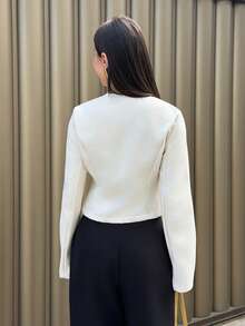 Yohana Edit 女士衬衫 斜纹软呢面料 不对称门襟 金属纽扣装饰 长袖衬衫 女士外套 女士西装外套 女士优雅通勤纯色海星纽扣衬衫 女士奶油色上衣 女士优雅上衣 女士奶油色外套 女士星形纽扣上衣 冬季外套 冬季夹克 秋季上衣 女士秋季装 女士冬季装 秋季外出上衣 Y2K复古风女士装 优雅女士衬衫 - 杏色 - 查看 3
