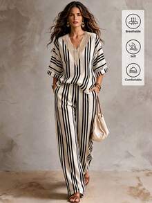 SHEIN بلوزة نسائية بخطوط مطبوعة وياقة على شكل حرف V مع أكمام مرقعة وتفاصيل شبكية، مقترنة ببنطال واسع الساق، مناسبة للارتداء اليومي والتنقل والعطلات ومكان العمل - متعدد الألوان - مشاهدة 1