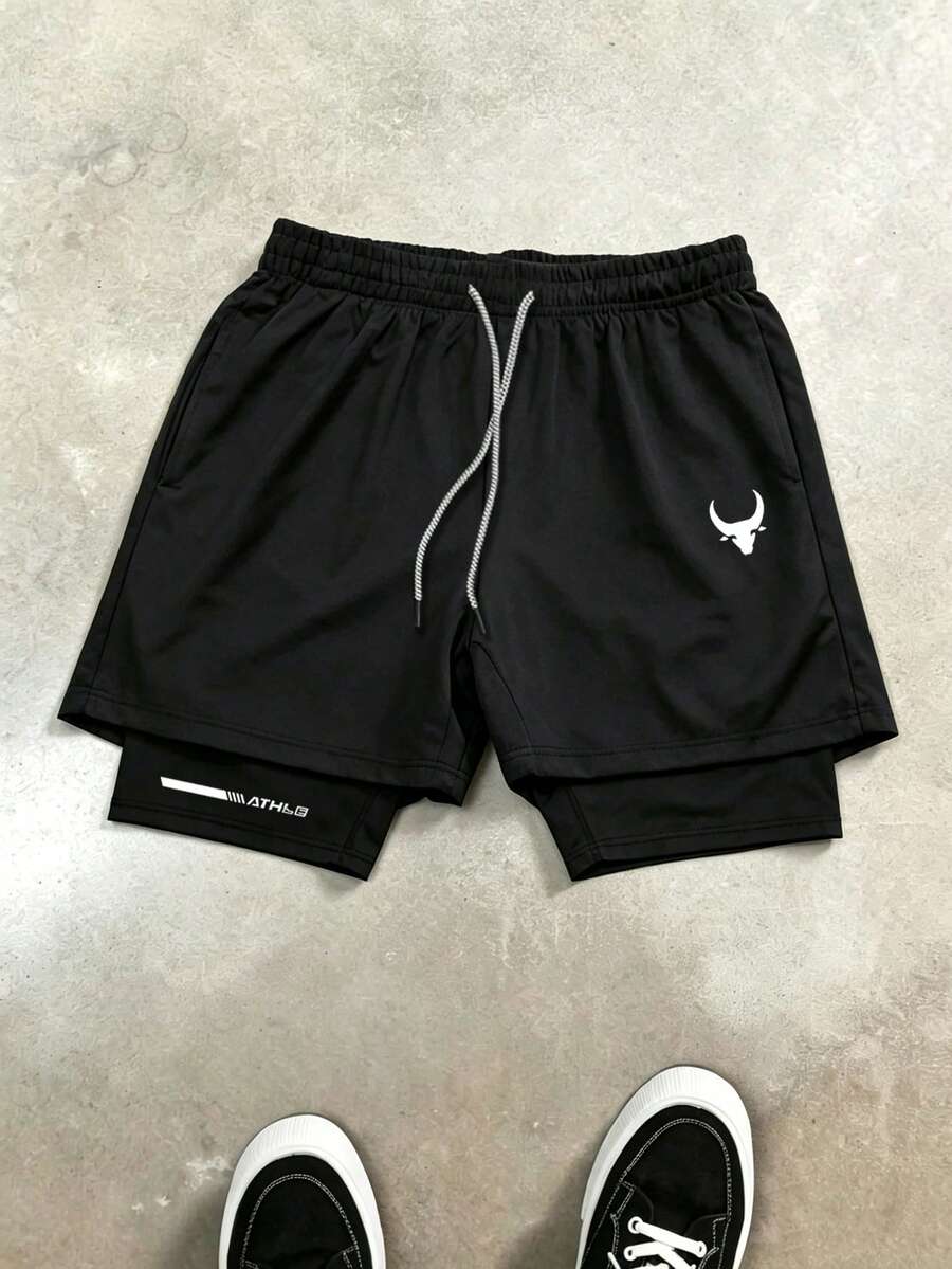 Gym Rark Pantalones cortos deportivos de doble capa con cintura de cordón y estampado de cuernos para hombre - Negro - Ver 1