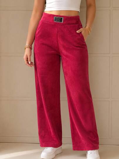 Pantalón de pierna recta para mujer, casual y elegante, tela tipo pana, bolsillos funcionales, ajuste de cintura natural con resorte, textura lisa con ligero acanalado. Interior cómodo.