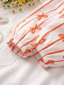 SHEIN Vintaside Kids 2件組女嬰可愛夏季度假紅色與白色幼兒嬰兒女童波西米亞風羅紋橘色荷葉袖蝴蝶結緞帶套裝 - 橘色 - 查看 4