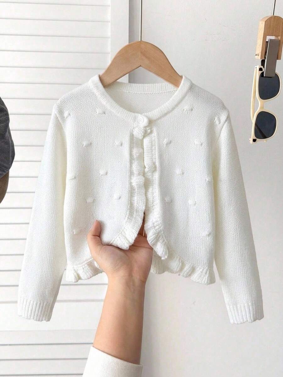 SHEIN 1件女童針織開襟衫,圓領,簡約休閒風,荷葉邊門襟,適中厚度,整潔下擺,柔軟親膚,單顆鈕扣,適合日常穿著、戶外出遊與玩耍,短版長袖外套毛衣開襟衫,春秋穿搭 - 白色 - 查看 1