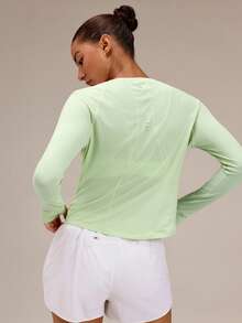 GLOWMODE Power Your Pace Ultra-Light Quick-Dry Running Long Sleeve Top With Curved Hems & Reflective Back Details Waist Length Jogging Gym Workout Active Wear - Grass Green - View 1