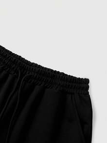ROMWE MEN Pantalones de chándal holgados con cordón en la cintura y estampado de letras para hombre - Negro - Ver 7