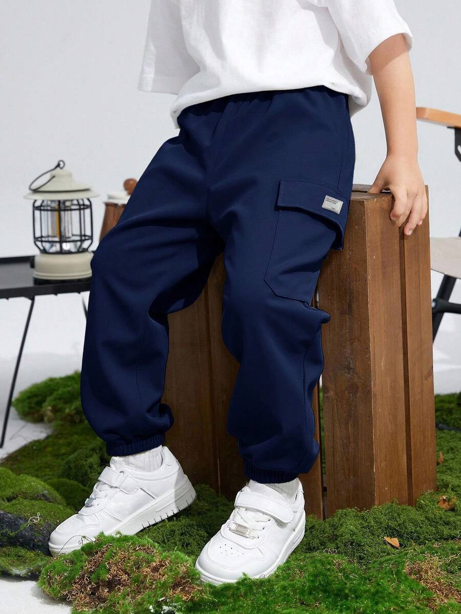 SHEIN 儿童/青少年男童休闲运动印花贴袋宽松抽绳工装裤,适合通勤、上学、日常休闲、旅行、运动,春夏秋冬皆宜。 - 藏蓝色 - 查看 1