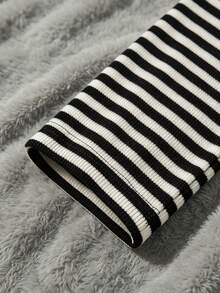 IslaSuriya Women's Long Sleeve Top With Striped Patchwork And Ruffle Hem - Black and White - View 4
