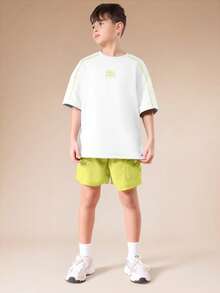 SUMWON Conjunto coordinado de verano para niños con camiseta oversize de cuello redondo y mangas cortas, y pantalones cortos con puntada de contraste - Amarillo - Ver 8