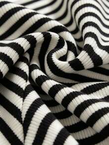 IslaSuriya Women's Long Sleeve Top With Striped Patchwork And Ruffle Hem - Black and White - View 3