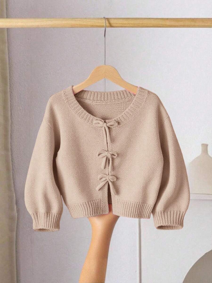 SHEIN LMoss Kids 女童針織毛衣,蝴蝶結裝飾,可愛休閒,柔軟舒適百搭,適合居家、派對、度假場合 - 卡其色 - 查看 1