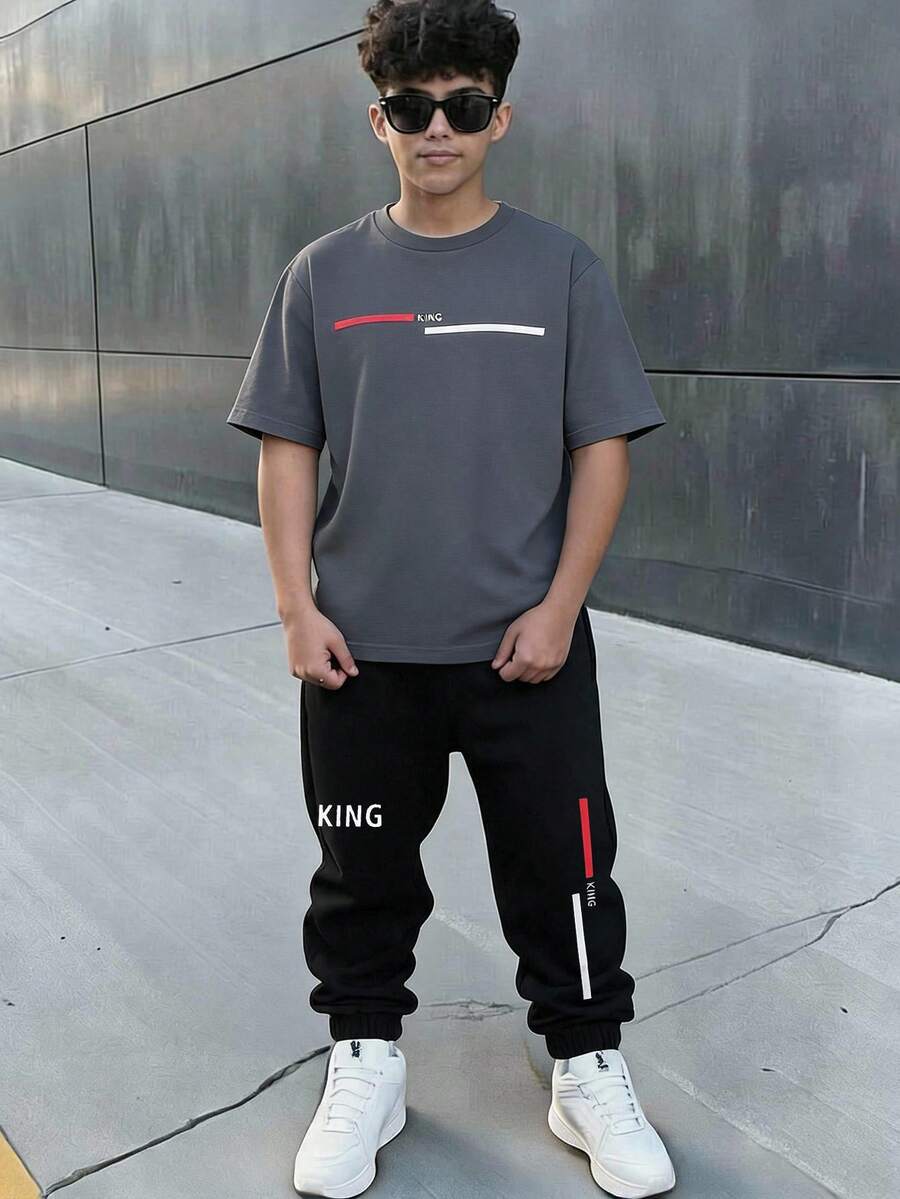 SHEIN 青少年男孩休閒日常舒適印花圖案圓領寬鬆短袖T恤與直筒印花對比色針織長褲套裝 - 彩色 - 查看 1