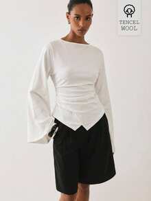 ATUI Studio Women's Tencel Wool Blend Bell Sleeve Knitted Ruched Waist T-Shirt With Asymmetric Hem - White - View 1
