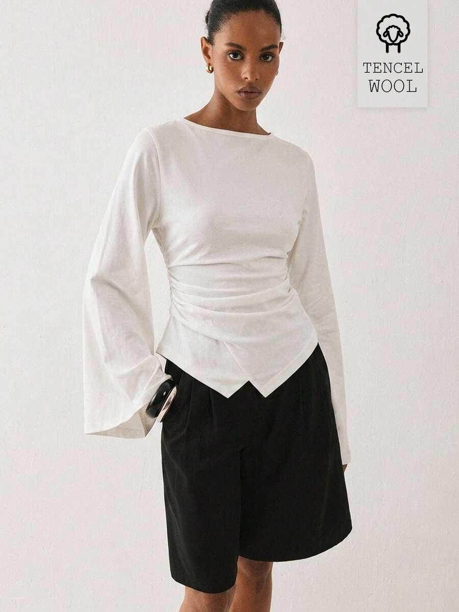 ATUI Studio Women's Tencel Wool Blend Bell Sleeve Knitted Ruched Waist T-Shirt With Asymmetric Hem - White - View 1
